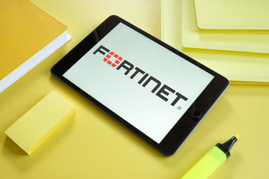KYIV, UKRAINE - June 30, 2021. Fortinet logo on the smartphone.