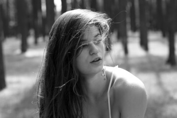 Black and white portrait of young woman with pierced nose