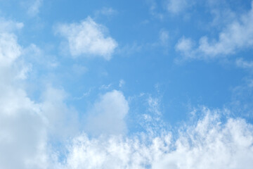 Naklejka na ściany i meble Blue sky background with clouds during moring sunrise.