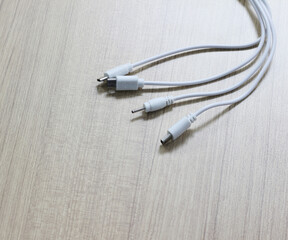 USB cable on wood background