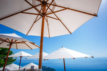 Umbrellas under the blue sky