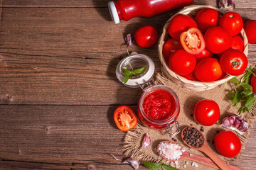 Fototapeta na wymiar Tomato confiture, jam, chutney, sauce in a glass jar