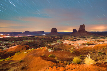Monument Valley under the stars, night view of famous buttes and valley traffic, very long exposure © jovannig
