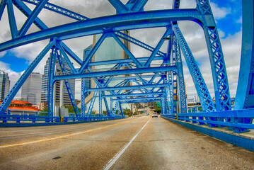 Fototapeta na wymiar JACKSONVILLE, FL - APRIL 8, 2018: Main Street Bridge as seen from a moving car. The city is a major attraction in Florida