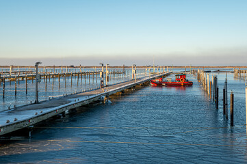 Boat pier on a freezing sunny day 