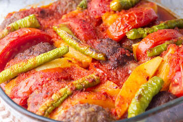 Traditional Homemade Turkish Food Kofte - Kofta with Tomato Sauce and Potatoes. (Turkish name; Izmir kofte)