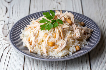 Traditional delicious Turkish food; Rice with chickpeas and chicken (Turkish name; Tavuklu nohutlu pilav or pilaf)
