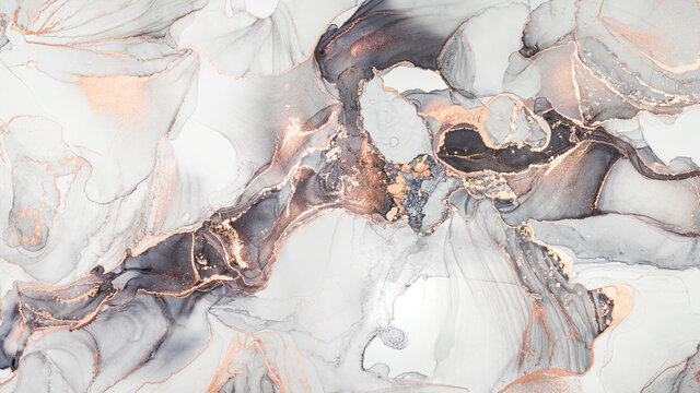 Luxury abstract fluid art painting in alcohol ink technique, mixture of black, gray and gold paints. Imitation of marble stone cut, glowing golden veins. Tender and dreamy design. © Екатерина Птушко