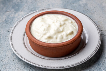 Homemade yogurt in a rustic bowl