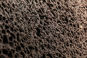 Texture of pumice stone as background, closeup