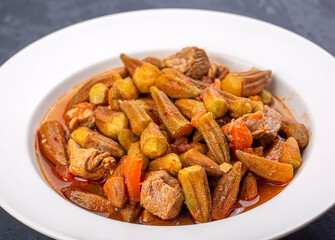 Bamya, Turkish traditional food. (Turkish cuisine) Homemade Food Okra in Plate. Organic Food.