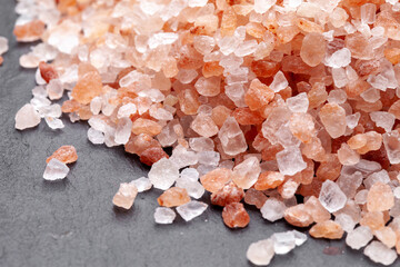 Fototapeta na wymiar Pink Himalayan salt close-up. Pink salt slide.