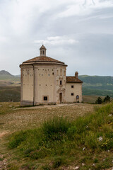 Fototapeta na wymiar Rocca Calascio, Abruzzo, Gran Sasso, Italy. June 2021.Church of Santa Maria della Pietà. It rises at the foot of the fortress of Calascio.
