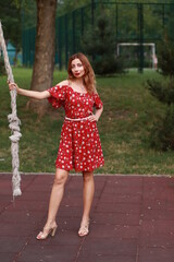 woman holding a rope in the playground