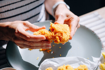 appetizing and hot chicken wings in an airy and crispy batter with different sauces