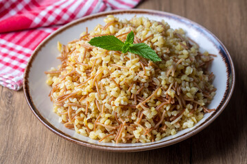Traditional delicious Turkish food; Bulgur pilaf with vermicelli (Turkish name; sehriyeli bulgur pilaf)