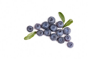 Fresh blueberries with bluberry leaves isolated on white background.