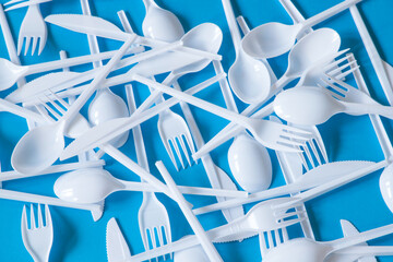 Plastic made disposable cutlery. Environment waste concept