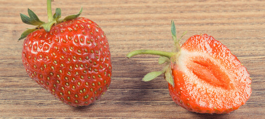 Fresh delicious strawberries on board. Healthy dessert and nutrition