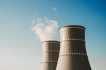 Ostrovets, Grodno region, Belarus - July 21, 2021: Nuclear power plant against the blue sky....