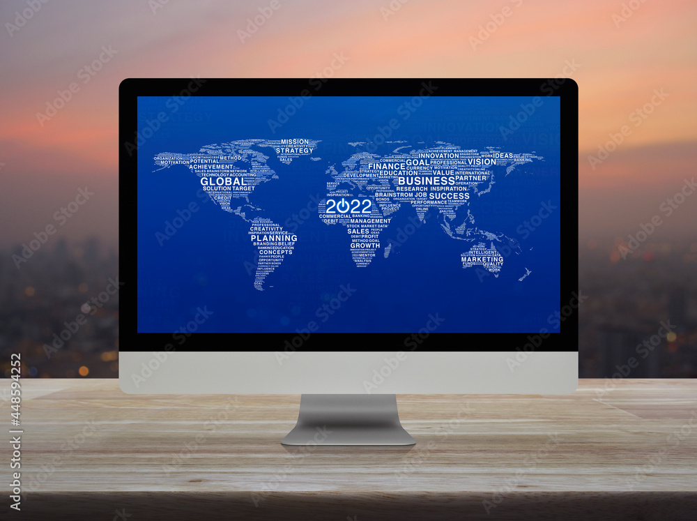 Poster 2022 start up business icon with global words map on computer screen on table over blur of cityscape