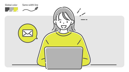 smile woman sending an email by laptop