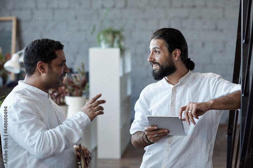 Aufkleber two confident businessmen discussing points of presentation or new project