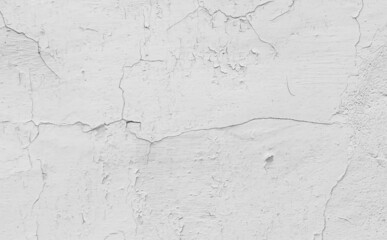 white cracked wall with visible details. background