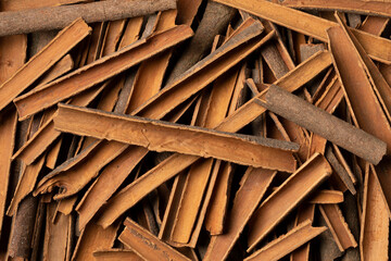Dried Cinnamon bark close up full frame as a background 