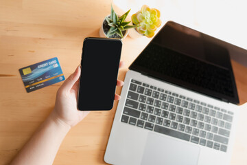 woman hand hold and use phone application for shopping and payment with clipping path