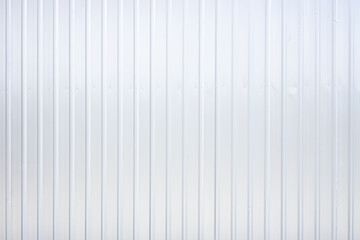 Striped wave silver steel metal sheet industry or construction site wall texture pattern for...