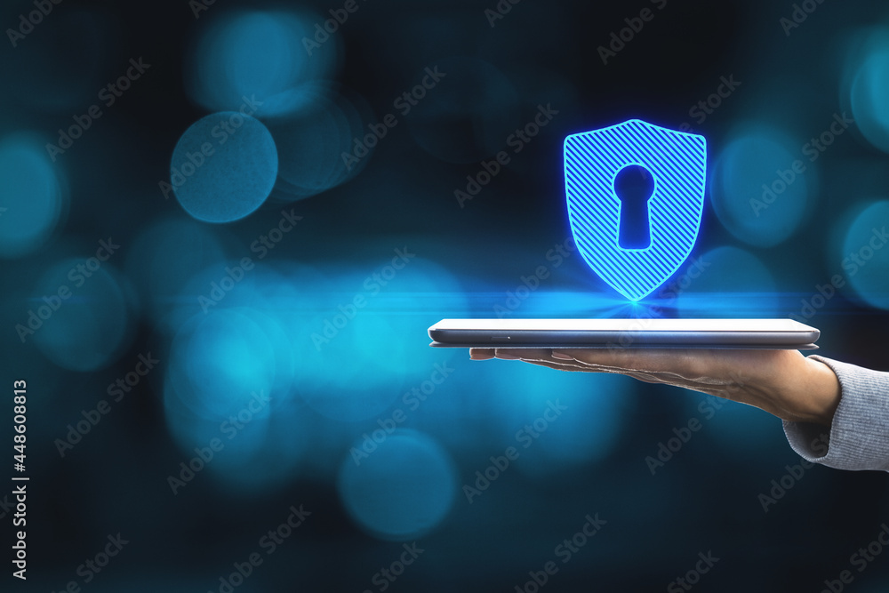 Poster close up of female hands holding smartphone with abstract digital padlock on blue background with mo