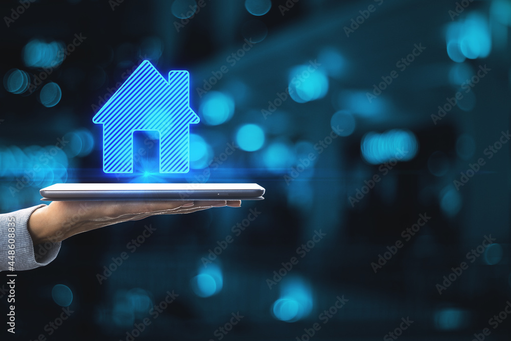 Poster close up of woman hands holding smartphone with abstract house icon on blue bokeh background with mo