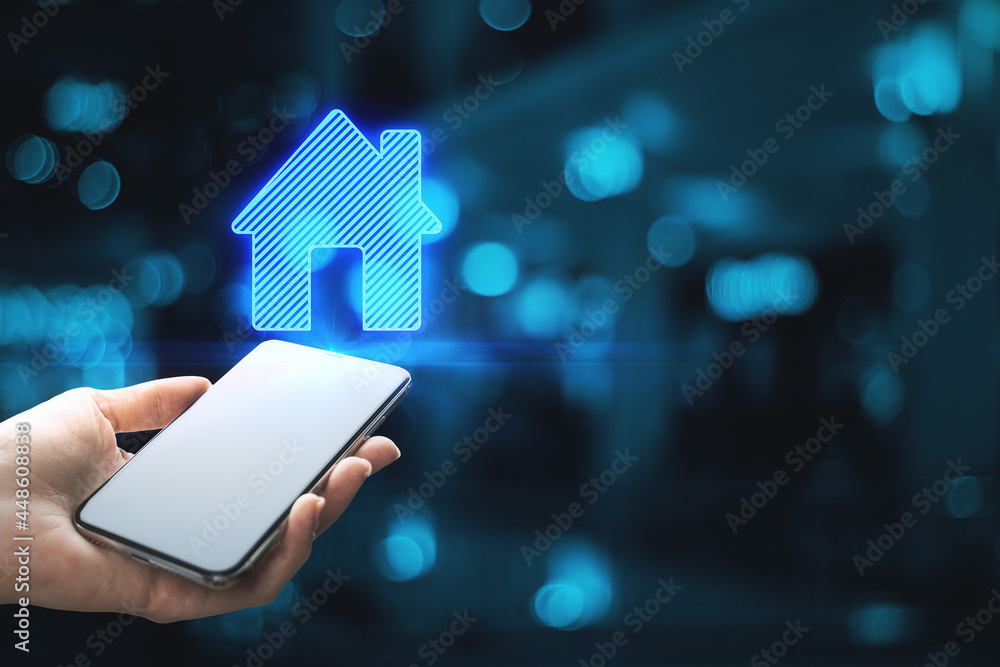 Poster close up of female hands holding phone with abstract house icon on blue bokeh background with mock u