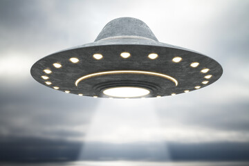 Abstract grey UFO flying in blurry dull sky with mockup place. Spaceship and science concept. 3D...