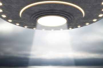 Abstract grey UFO flying in dull sky with mock up place. Spaceship, invasion, mystery and science concept. 3D Rendering.