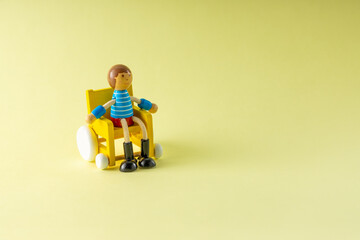 child in wheelchair toy