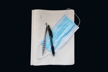 Notebook with mask pencil and pen for online virtual or hybrid learning during the school year
