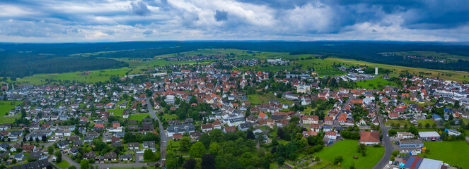 Fototapeta na wymiar Aerial view around the city Pfalzgrafenweiler in Germany. On sunny day in spring