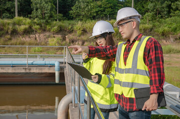 Environmental engineers work at wastewater treatment plants,Water supply engineering working at...