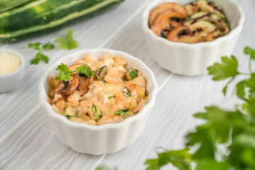 Close-up casserole with turkey, zucchini and cheese 