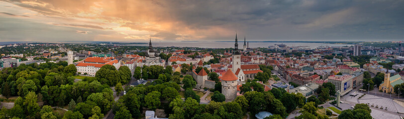 Fototapeta na wymiar View of the church and old town towers in Tallinn, Estonia. Beautiful nature of Tallinn.