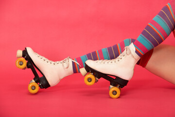 legs with high striped stockings and retro skates