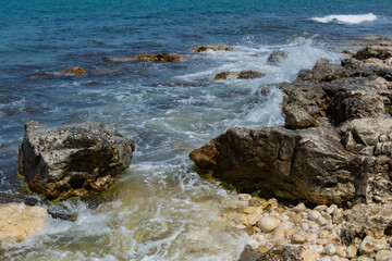 Fototapeta na wymiar Rock in the sea bay. Sea bay rock view. 