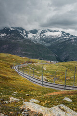 Railway in mountains. Zermatt, Swiss Alps. Adventure in Switzerland, Europe.