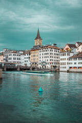 Old town in Zurich city, Switzerland. Panorama of river and embankment with historic buildings....