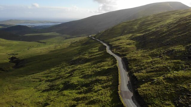 areal footage of road in mountains cornor pass Dingle Kerry Ireland