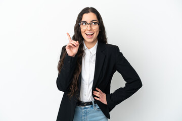 Young business woman isolated on white background thinking an idea pointing the finger up