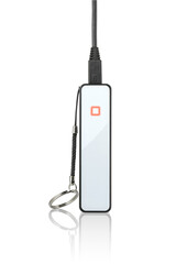 Edgy power bank with cable standing on white background 