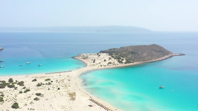 Aerial view of Simos beach in Elafonisos island in Greece. Elafonisos is a small Greek island the Peloponnese with idyllic exotic beaches and crystal clear waters. Laconia, Greece, Europe
